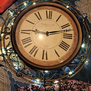 Antique Style Brown Wall Clock with Roman Numerals by